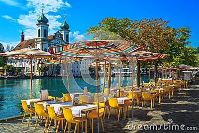 Street cafe on the shore of the Reuss river, Lucerne Stock Photo