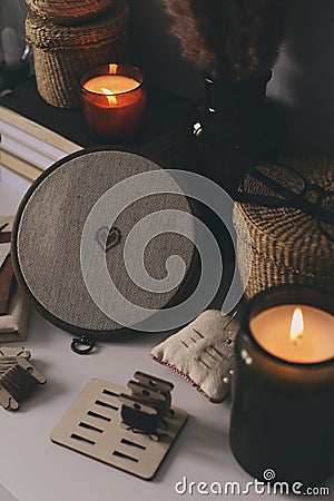 cozy winter or autumn evenings at home with cross stich. Stock Photo