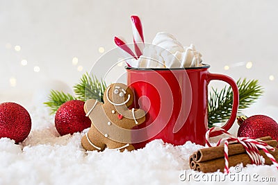 Cozy winter composition with a cup of hot chocolate with marshmallows gingerbread man cookies on a light background Stock Photo