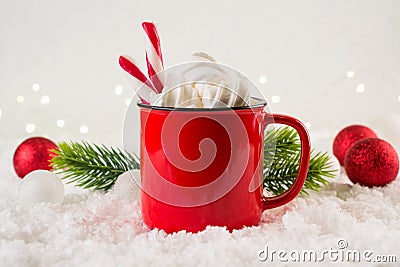 Cozy winter composition with a red cup of hot chocolate with marshmallows on a festive background Stock Photo