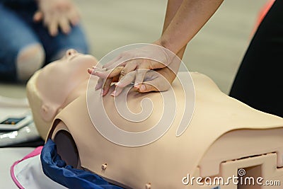 CPR First Aid Training with CPR dummy Stock Photo