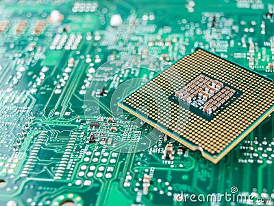 CPU connector on the circuit motherboard with pressure contacts for connecting a silicon microprocessor, CPU selection during comp Stock Photo