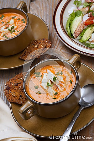 Crab Bisque and Blood Orange Crab Posole Salad Stock Photo