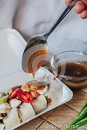 Crab fresh spring rolls with sweet sauce,crab,chili,cucumber,egg,bean sprouts,spring onion wrap with roti dough sheet in white box Stock Photo