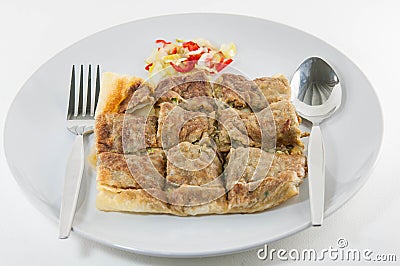 Crab Mataba. Kind of Muslim and Indian food made of flour isolate on plate Stock Photo