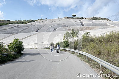 tourists visit the cretto by artist Alberto Burri, Gibellina vecchia, Sicily, Italy Editorial Stock Photo