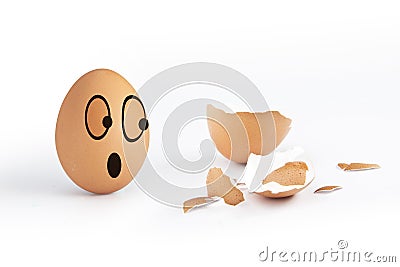 Crack Egg with funny Egg Stock Photo
