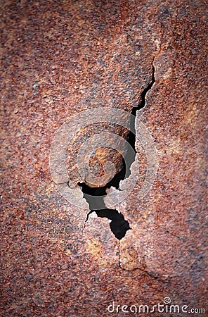 Crack at rusty metal plate Stock Photo