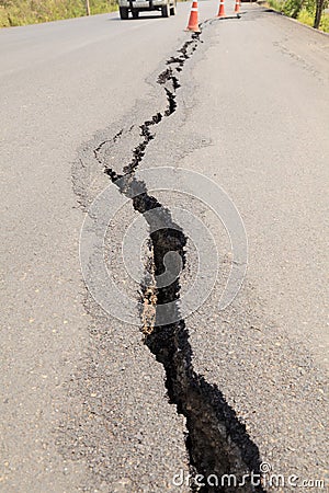 Cracked asphalt road Stock Photo