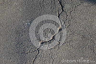 Cracked asphalt texture weathered by time Stock Photo