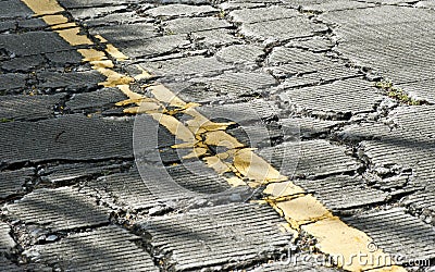 Cracked cement road Stock Photo