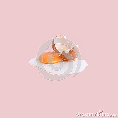 Cracked egg on pastel Stock Photo