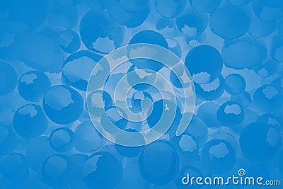 Cracked eggs pattern as colorful blue background. Top view, flat lay, selective focus. Stock Photo