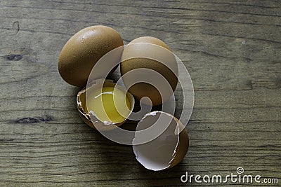 Cracked Fresh Brown Pastured Eggs Stock Photo