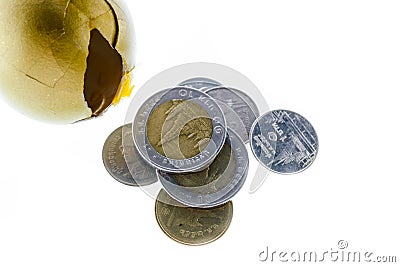 Cracked golden egg and Thai coins isolated Stock Photo