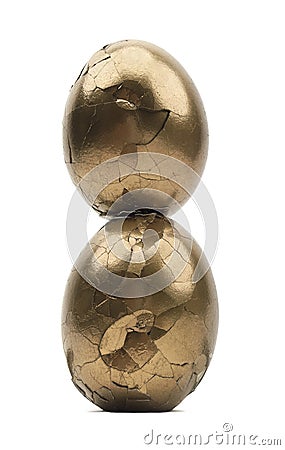 Cracked Golden Eggs Stacked Stock Photo