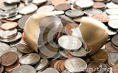 Cracked Golden Nest Egg Stock Photo