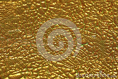 Cracked golden paint on canvas macro background high quality fifty megapixels prints Stock Photo