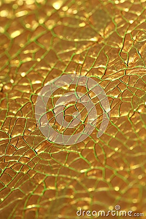 Cracked golden paint on canvas macro background high quality fifty megapixels prints Stock Photo