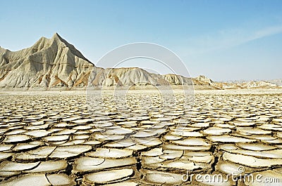 Cracked land and Dry Mountain Stock Photo
