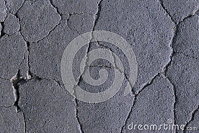 cracks on the asphalt, road destruction, beautiful abstract background of cracks Stock Photo