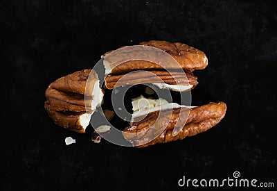 Cracked pecan nut Stock Photo