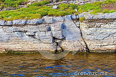 Cracked Rocks Erode in the River Stock Photo