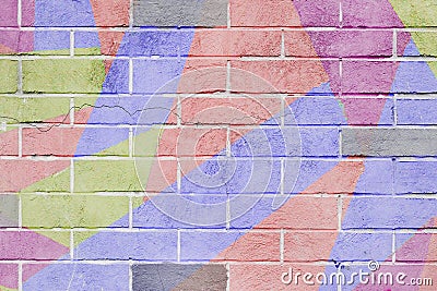 Cracked and scratched wall with graffiti. Abstract detail of urban street art design close-up, pastel colors. Modern stylish Stock Photo