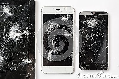 Cracked screen of smartphone mobile black glasses top view photography. Stock Photo