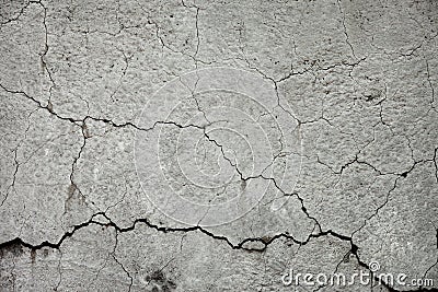 Cracked stone wall Stock Photo