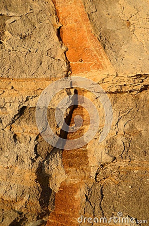 Cracked surface of a clay slope. Stock Photo