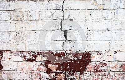 Cracked whitewashed brick wall Stock Photo