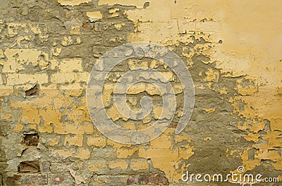 Cracked yellow paint old wall Stock Photo