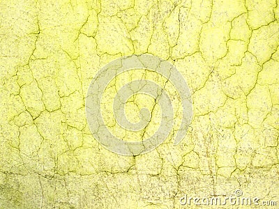 Cracked yellow ragged wall background texture Stock Photo