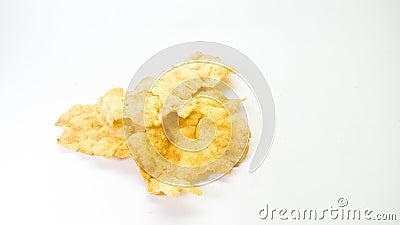 Cracker chips made from melinjo or belinjo seeds, Indonesian specialty Gnetum gnemon, selected focus, on white background Stock Photo