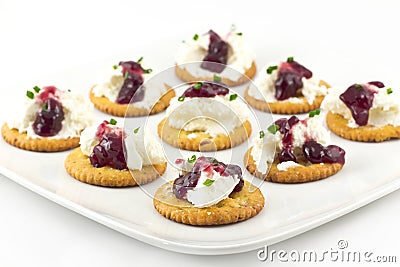 Crackers with Cream Cheese Grape Jelly and Chives Stock Photo