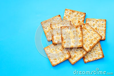 Crackers with sugar on blue background Stock Photo