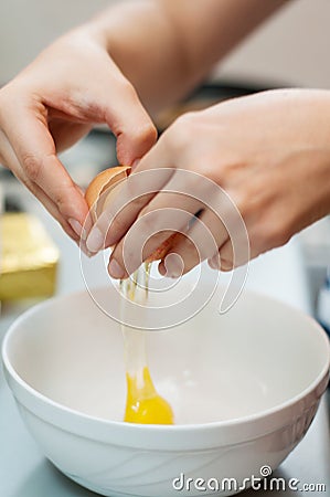 Cracking egg Stock Photo