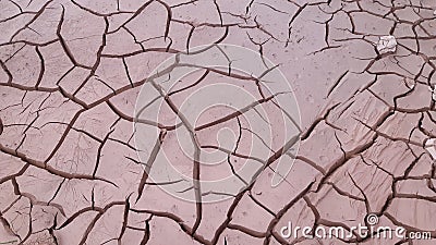 Cracks on soil due to water scarcity Stock Photo