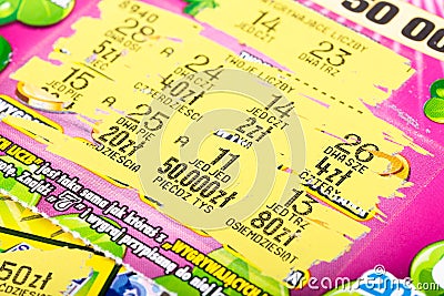 Polish scratch card lotto lottery ticket scratch-off, scratchie with numbers. Gambling addiction, winning money lottery paper card Editorial Stock Photo