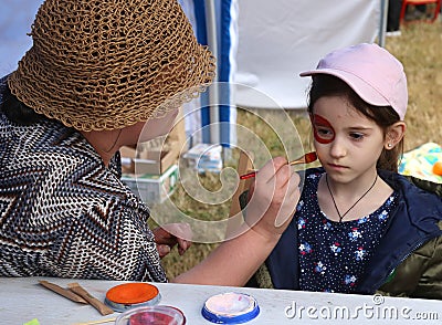 Open air fete for Ukraine refugees (mostly women and children) in Cracow, Poland. Editorial Stock Photo