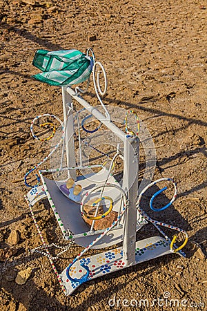 Cradle given as a part of fertility rite at Kyrk Molla Forty Mullahs hill in the ancient Konye-Urgench, Turkmenista Stock Photo