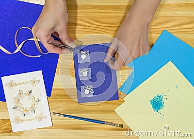Craft greeting card. Income from hobbies. Home business. Stock Photo