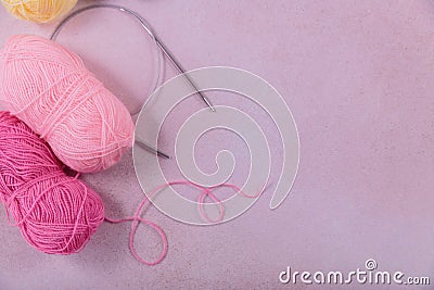 Craft knitting hobby background with skeins of soft pastel color wool yarn Stock Photo