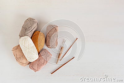 Craft knitting hobby background with yarn in natural colors Stock Photo