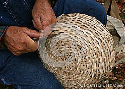 Crafting old-fashioned wicker basket Stock Photo