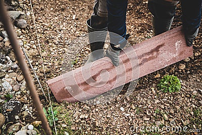 Craftman with a bricklayer building a project Stock Photo