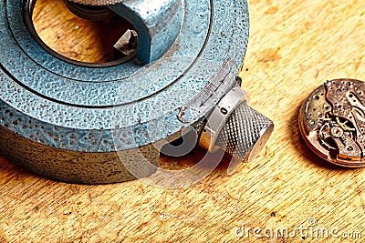 Craftsman's table, watches, gears, springs, steampunk aesthetic Stock Photo