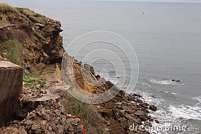 Crag next to sea Stock Photo