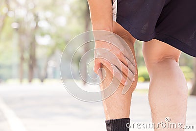 Cramp in leg while exercising. Sports injury concept Stock Photo